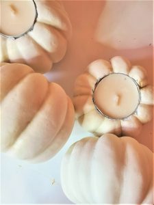 easy-pumpkin-candle-holders-in-four-steps-showing-the-difference-with-brown-wax-and-not-with-wax