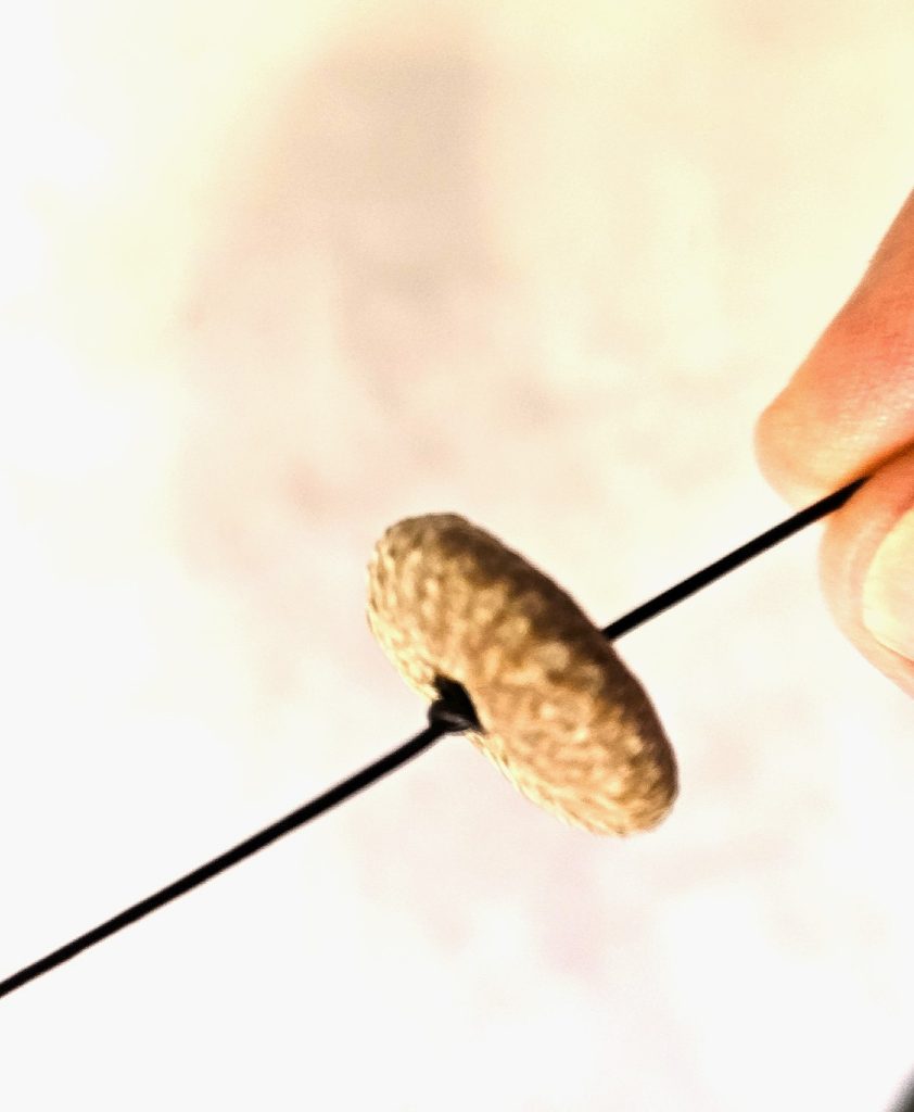 showing-the-knot-on-the-outside-of-cap
