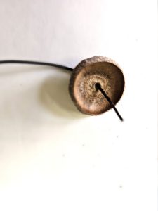 wire-through-the-inside-of-cap