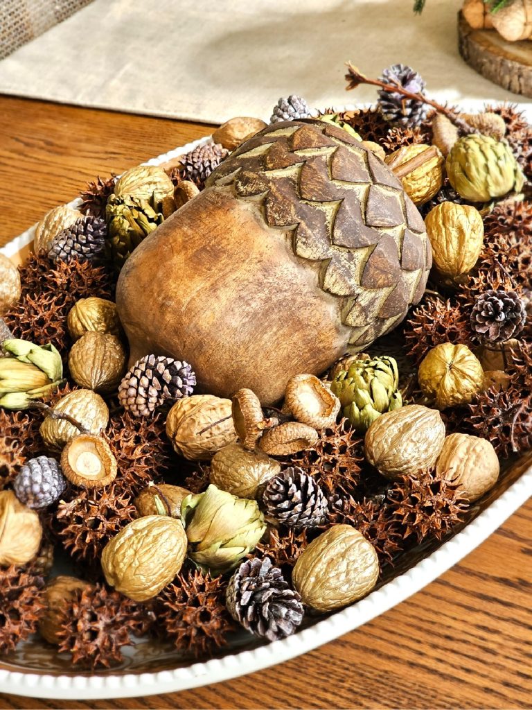 large-acorn-centerpiece-with-walnuts-acorn-caps-dried-artichokes-seed-pods