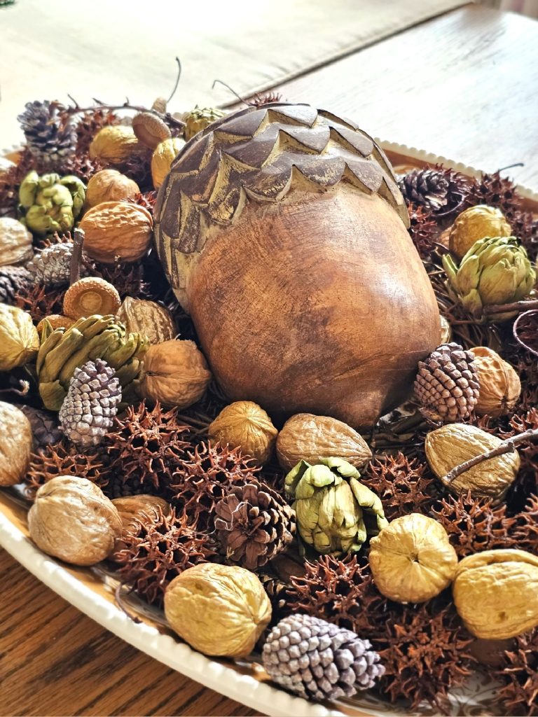 large-acorn-centerpiece-with-walnuts-pinecones-dried-artichokes-seed-pods