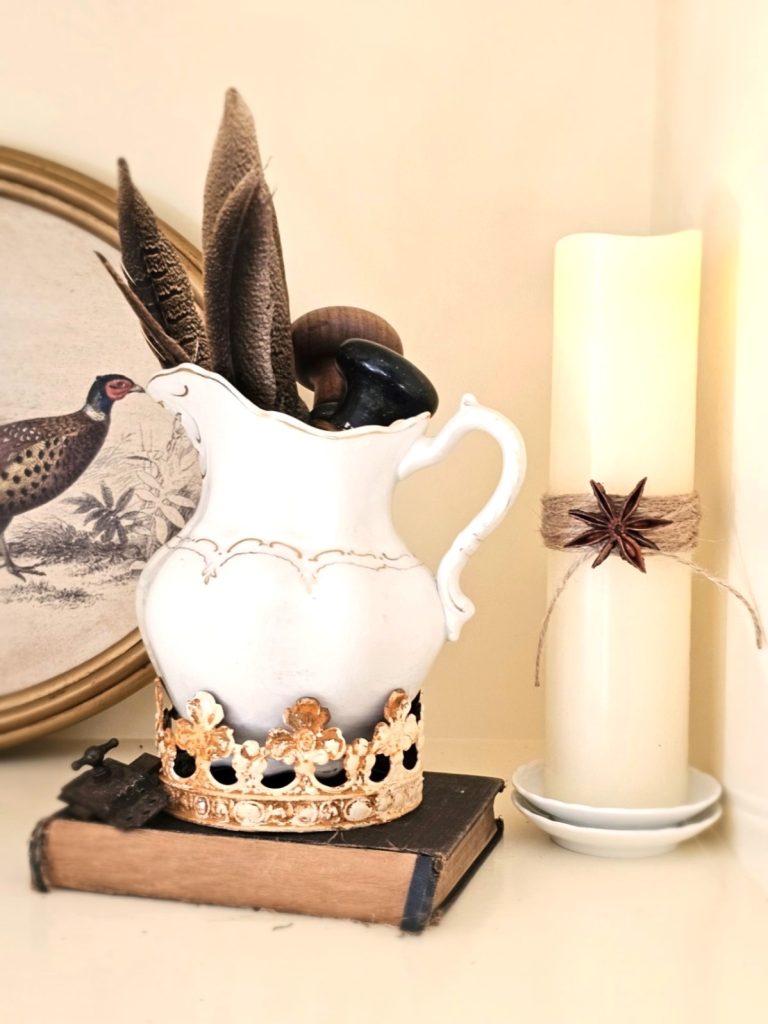 pitcher-sitting-in-a-crown-filled-with-pheasant-feathers