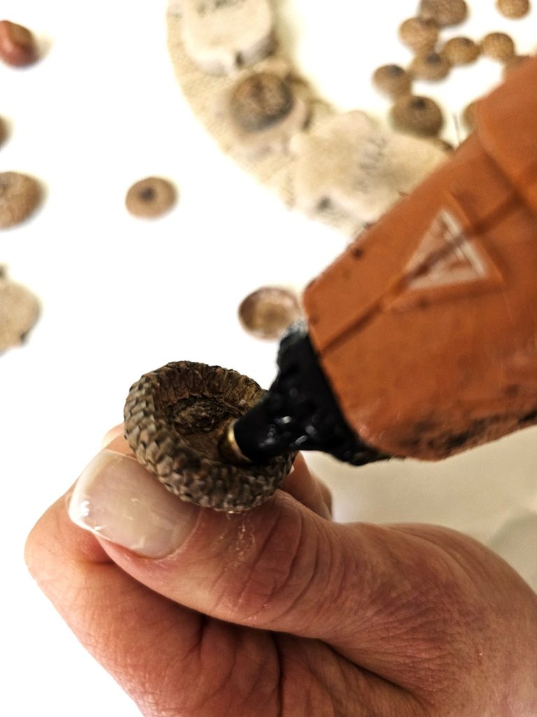 adding-glue-to-acorn-cap