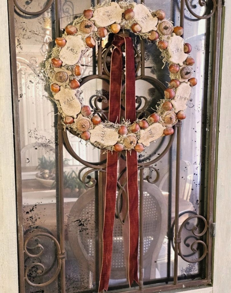 diy-fall-salt-dough-wreath-for-easy-cozy-decor-closer-look-at-the-wreath-hanging-with-long-ribbon-tails-on-door