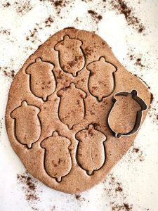 diy-pumpkin-spice-salt-dough-recipe-easy-fall-craft-dough-roll-cut-into-acorn-shapes