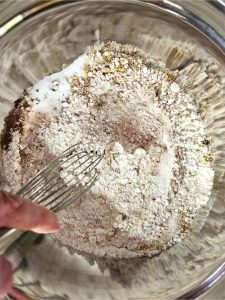 diy-pumpkin-spice-salt-dough-recipe-easy-fall-craft-whisking-flour-and-spices