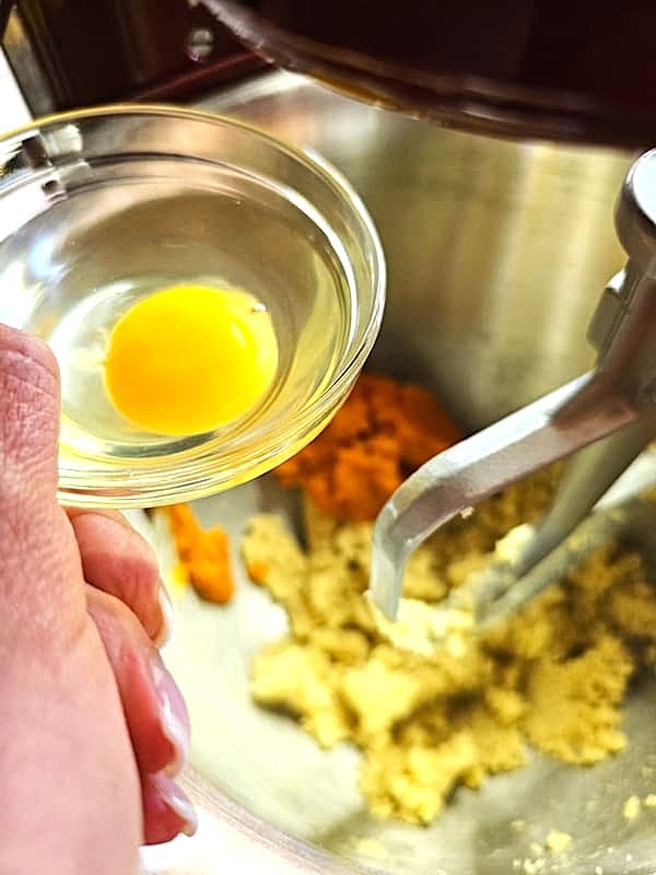 adding-egg-to-mixer