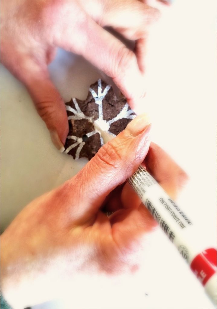 adding-details-to-snowflake-with-white-ink