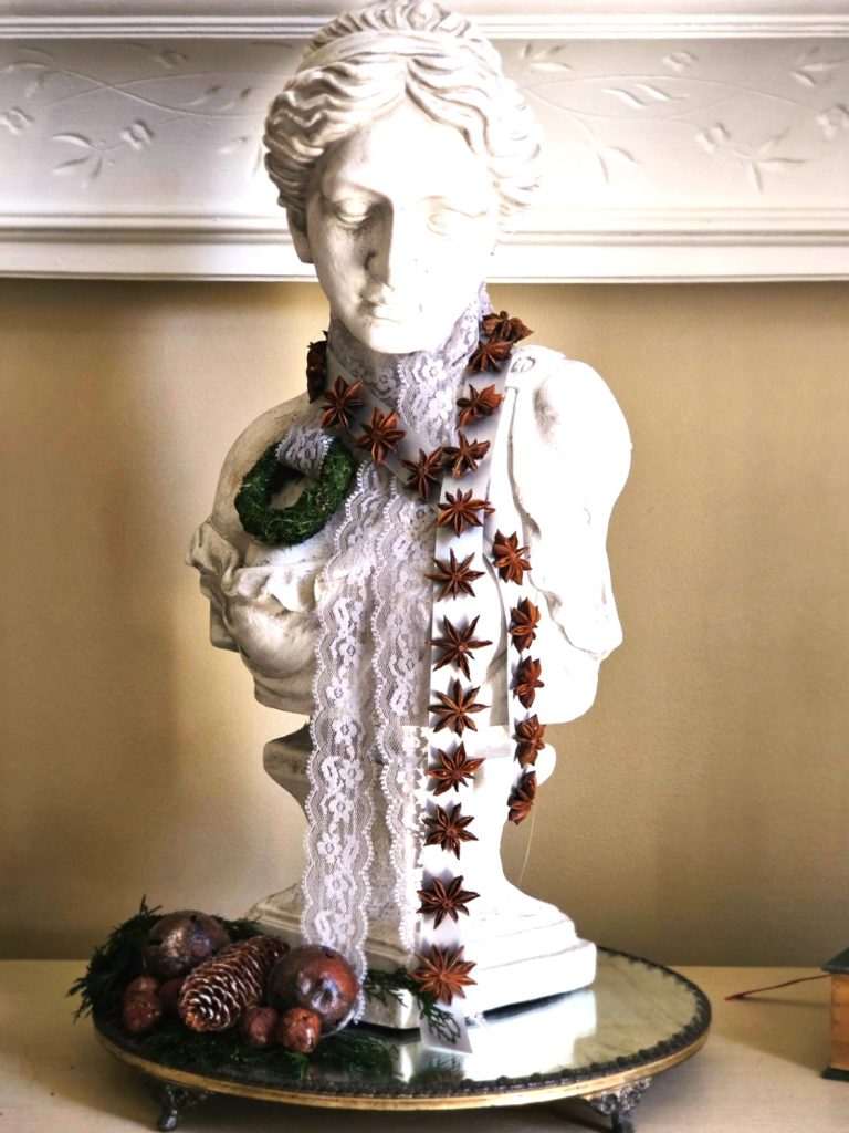 female-bust-star-anise-garland-mini-wreath-rusty-bells