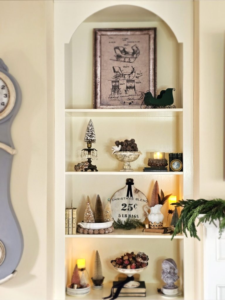 full-bookcase-decorated-for-christmas-natural-pieces