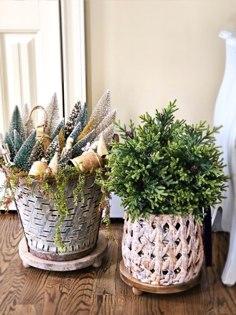 olive-bucket-with-trees-brass-bells-basket-with-evergreens
