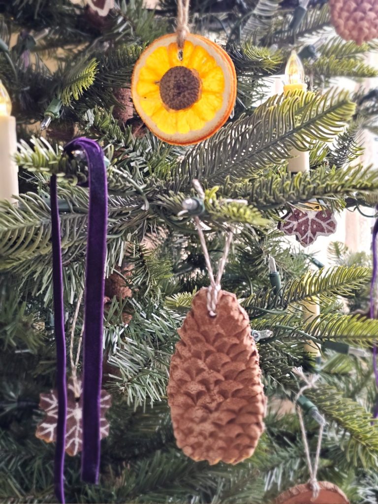 orange-with-acorn-cap-pinecone-salt-dough-ornament-dark-purple-velvet-ribbon
