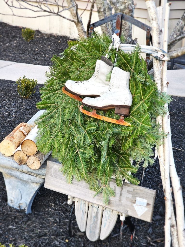sled-outside-with-wreath-and-ice-skates