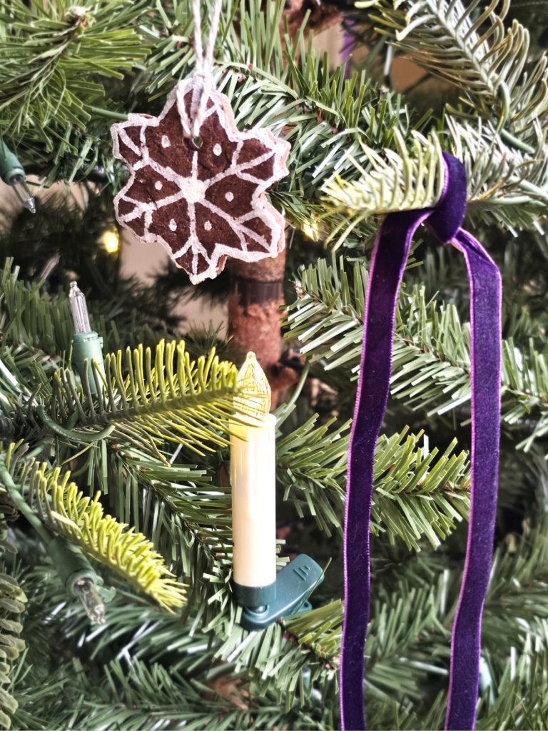 natural-christmas-decor-ideas-for-any-home-style-snowflake-salt-dough-ornament-with-dark-purple-velvet-ribbon