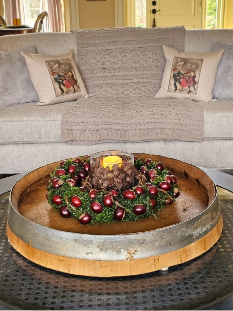 throw-pillows-gray-throw-blanket-wreath-on-table-as-ceneterpiece