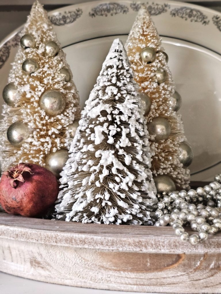 white-trees-with-a-pomegranate-mercury-glass-beads-in-a-wood-tray