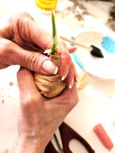 holding-brown-paper-around-stem-before-letting-it-dry