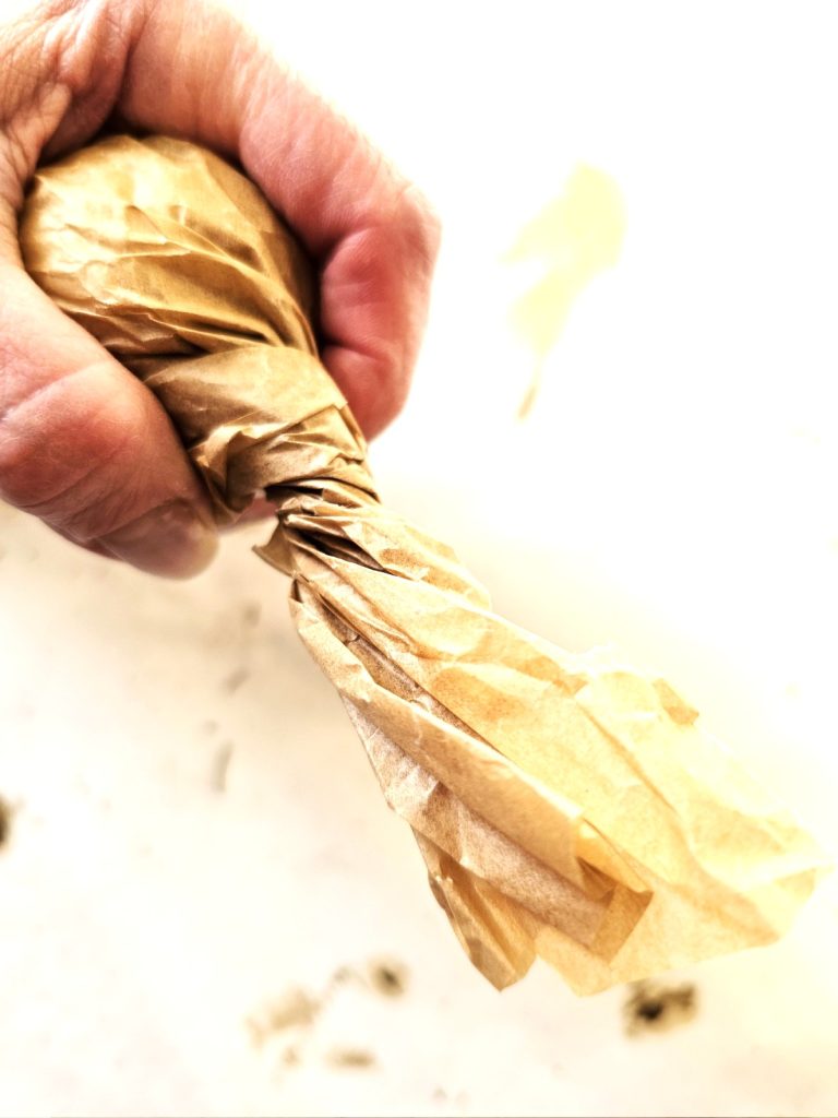 paper-twisted-around-ball
