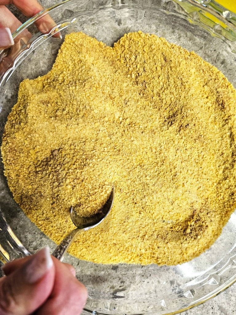 mixing-spices-with-crumbs