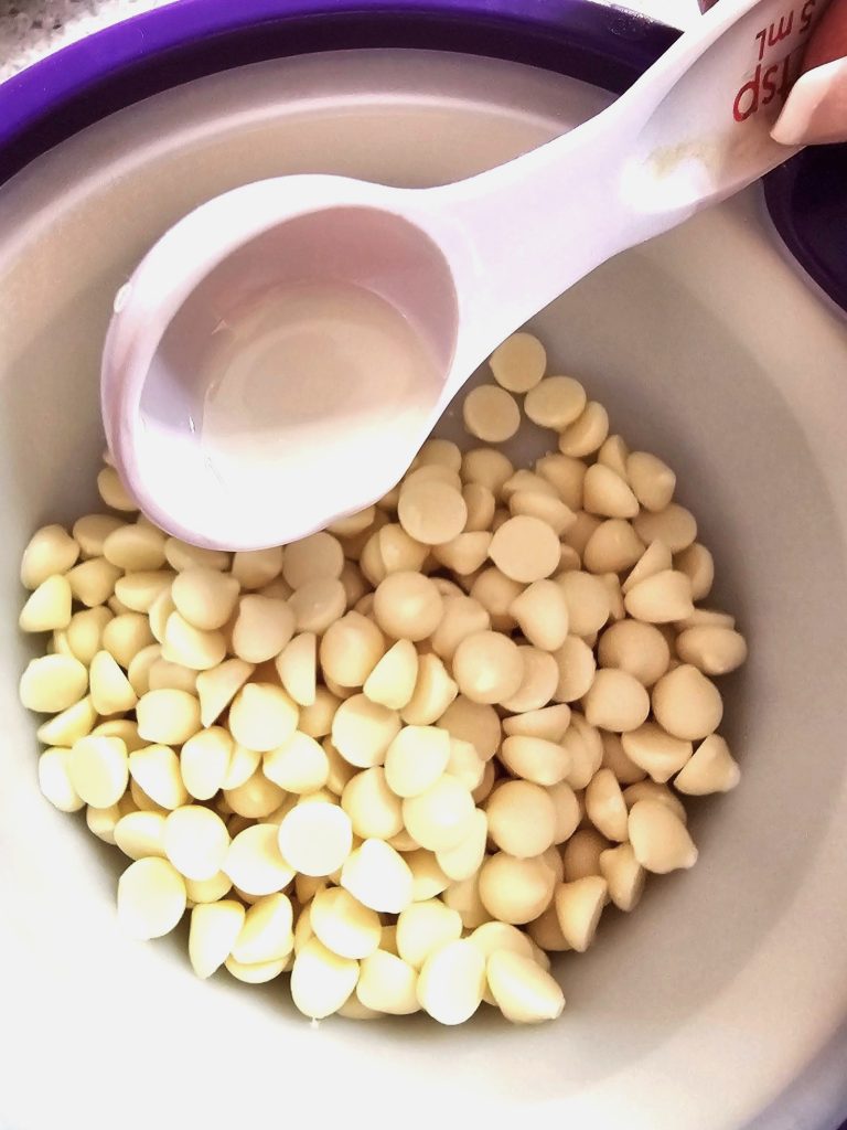 adding-oil-to-white-chips-to-melt