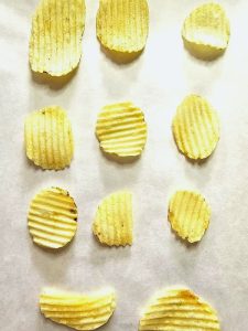 irresistible-chocolate-covered-chips-recipe-potato-chips-on-parchment