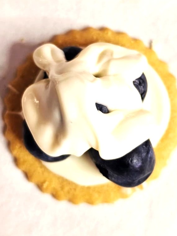 top-coating-of-chocolate-over-blueberries
