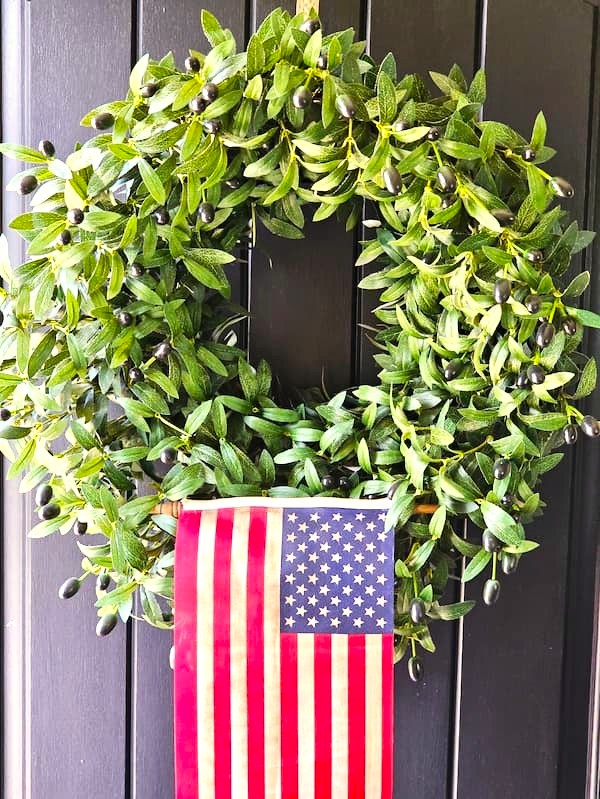flag-aged-with-wax-hanging-from-a-wreath
