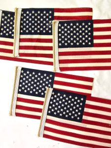 make-diy-vintage-spindle-american- flags-for-decor-white-ribbon-added-to-flags