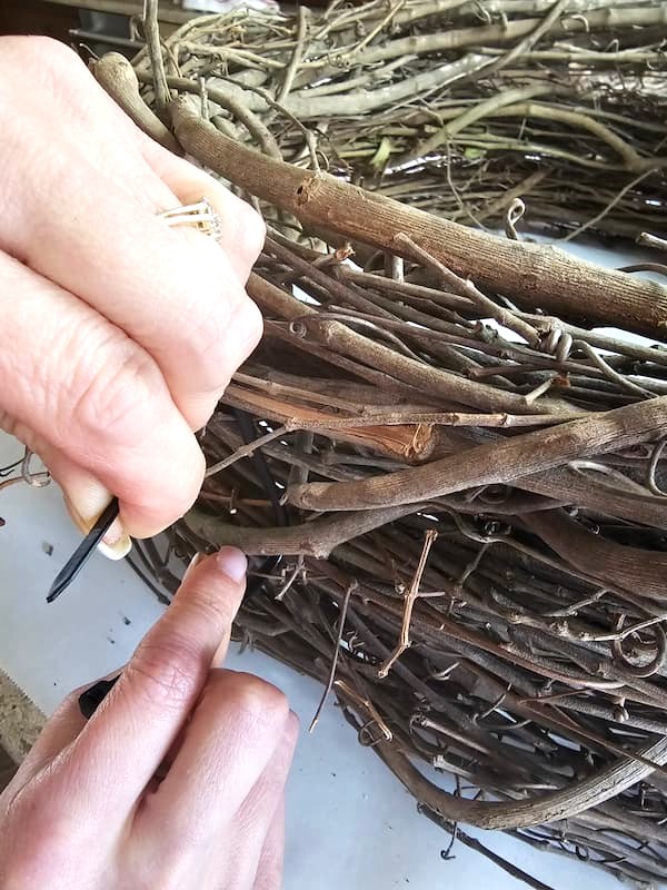 adding-more-plastic-ties-to-wreaths-to-make-planter