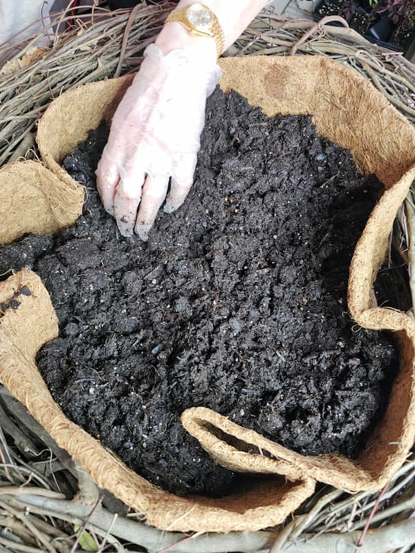 adding-soil-to-liner
