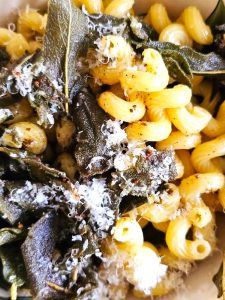 10-minute-sage-butter-sauce-recipe-finished-dish-with-grated-cheese-on-top-featured-image