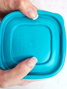 me-showing-flavored-butter-in-a-container-to-stay-fresh