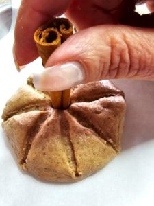 diy-salt-dough-pumpkins-make-cozy-fall-decor-me-adding-stem-to-pumpkin