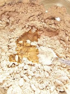 mixing-water-into-flour