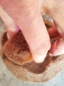 me-rolling-dough-ball-in-cinnamon-and-sugar