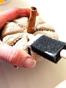 me-adding-decoupage-glue-to-protect-dough