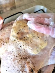 flattening-butter-under-turkey-skin