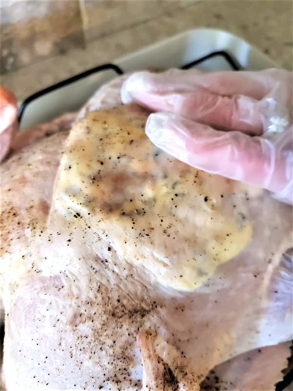 flattening-butter-under-turkey-skin