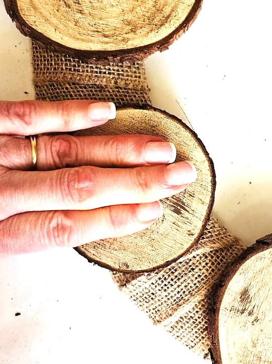 me-holding-wood-slice-to-set