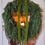 cozy-natural-Christmas-decorating-ideas-wreath-hanging-on-china-cabinet-door-featured-image