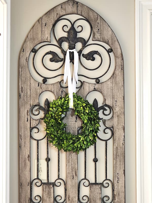 boxwood-wreath-hanging-with-ivory-ribbon