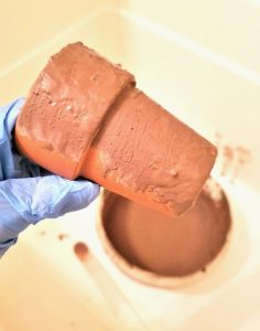 easily-age-terracotta-pots-using-lime-adding-to-a-small-pot