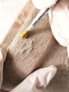 me-adding-green-paint-to-pot-to-look-like-moss