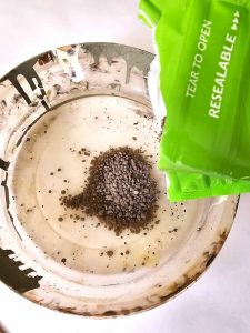 pouring-lime-in-plastic-container