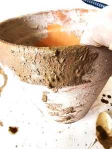 me-showing-the-lime-addedd-heavier-on-rim-of-pot